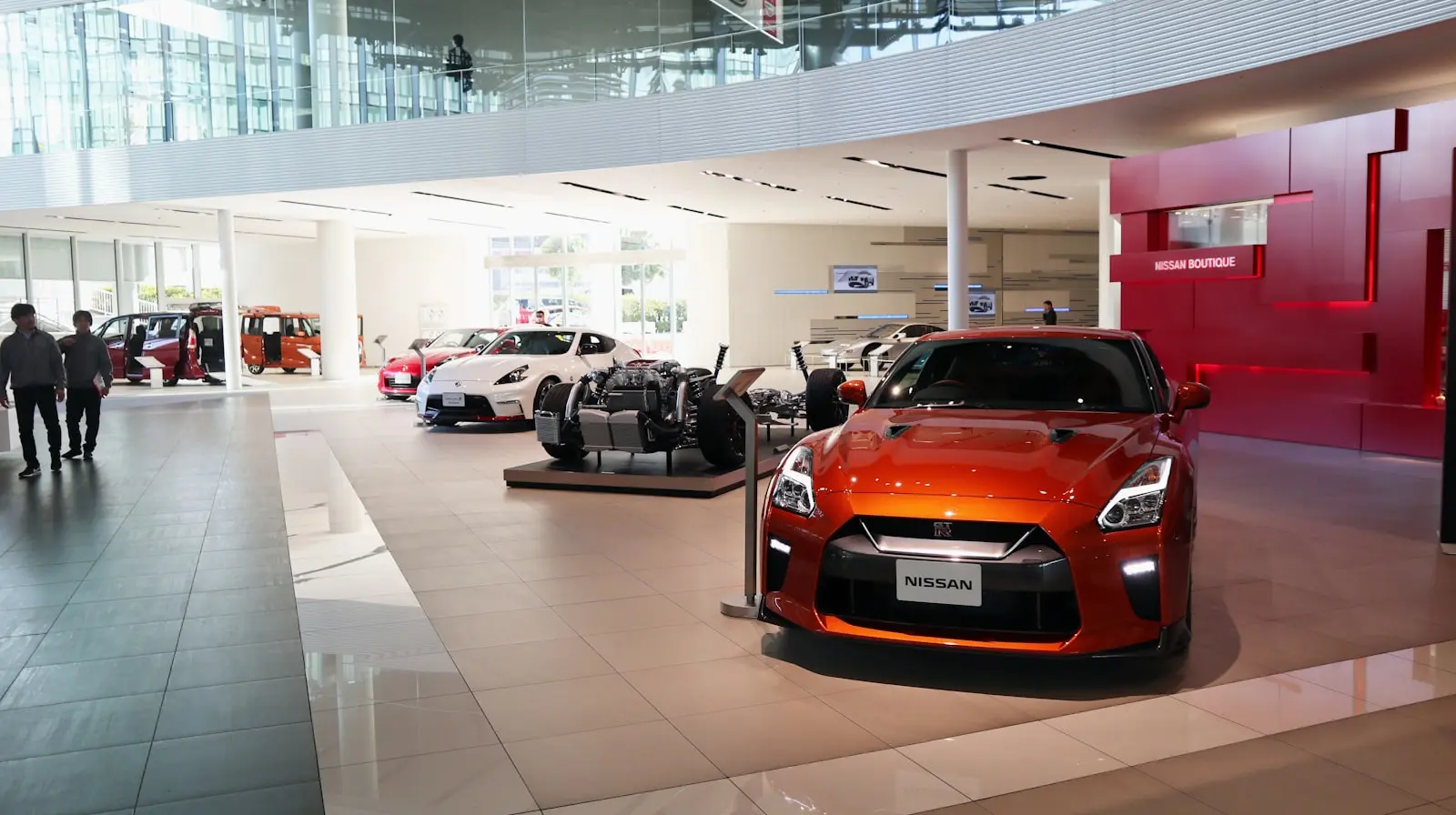 HeyAuto platform interface running in a modern dealership showroom